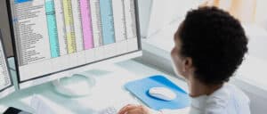 Medical billing specialist using computer