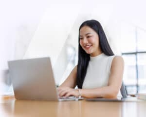Medical billing specialist using laptop