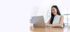 Medical billing specialist using laptop