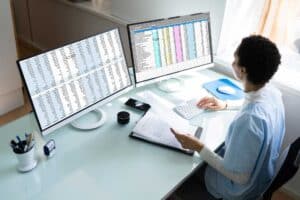 Medical billing specialist using computer
