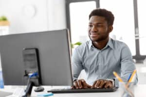 american businessman with computer working at office